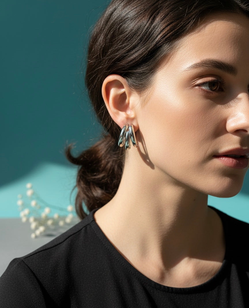 Steenless Steel , 14K Gold plating, Triple-hoop silhouette.