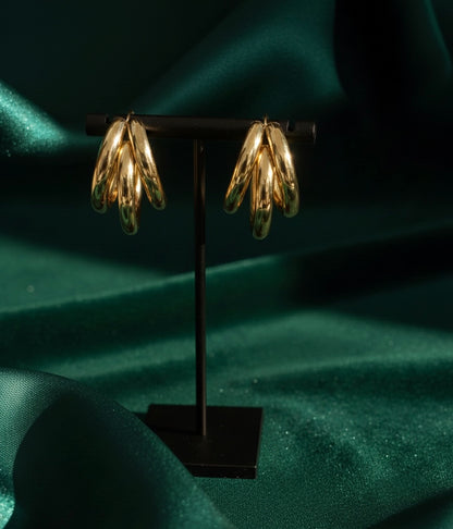 Steenless Steel , 14K Gold plating, Triple-hoop silhouette.