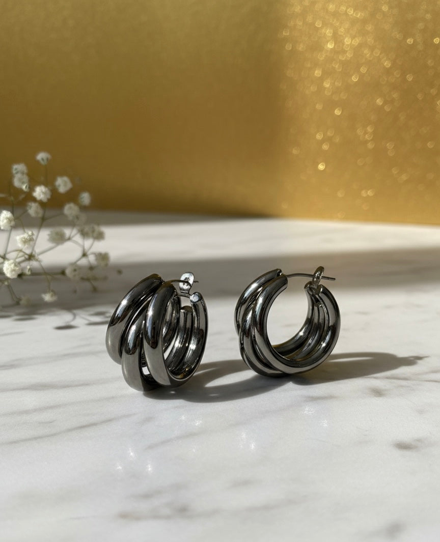 Steenless Steel , 14K Gold plating, Triple-hoop silhouette.