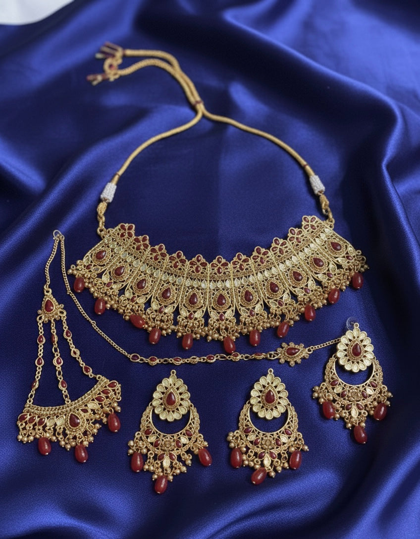 Elegant Gold-Plated Bridal Jewellery Set with Ruby Accents