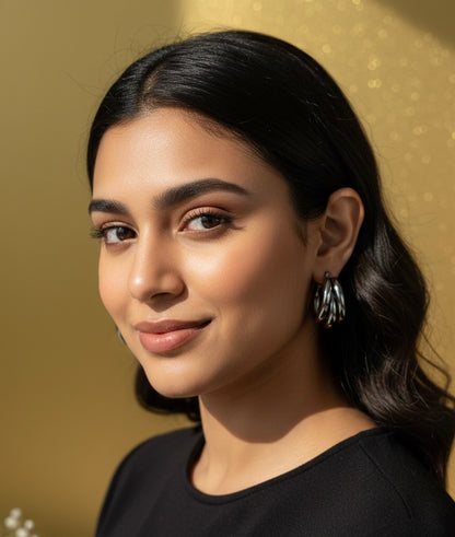 Steenless Steel , 14K Gold plating, Triple-hoop silhouette.