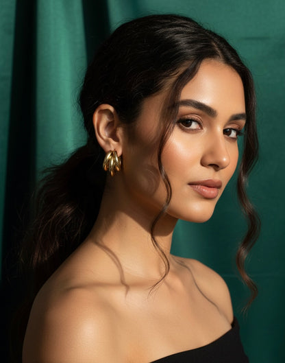 Steenless Steel , 14K Gold plating, Triple-hoop silhouette.