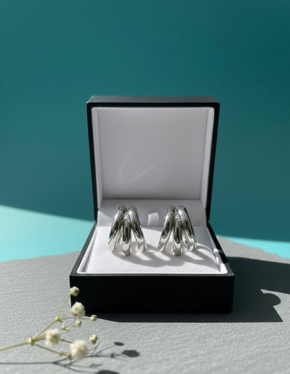 Steenless Steel , 14K Gold plating, Triple-hoop silhouette.