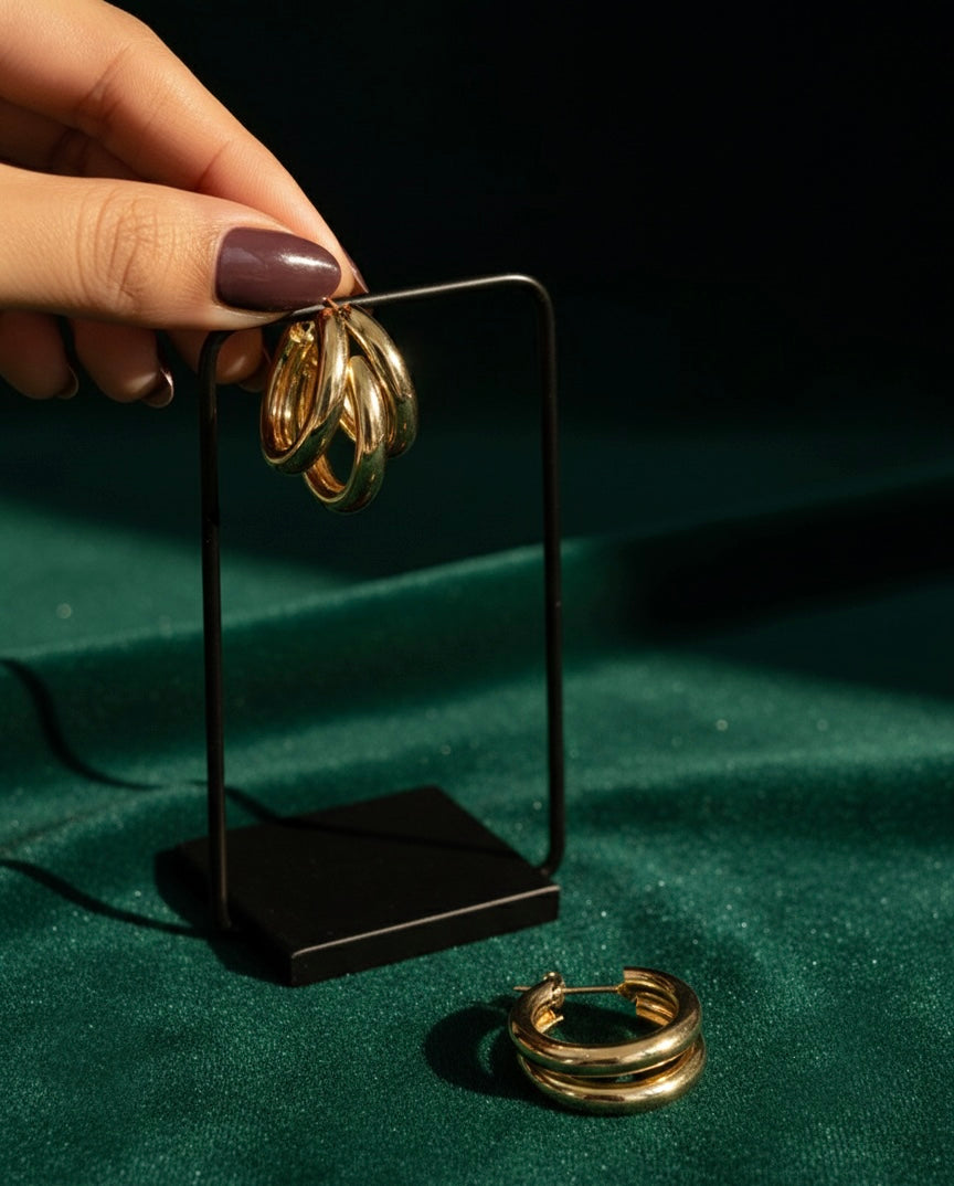Steenless Steel , 14K Gold plating, Triple-hoop silhouette.