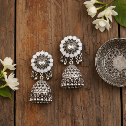 Hera Oxidized Silver White Enamel Jhumka Earrings